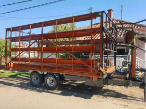 Samoutovarna i samoistovarna prikolica za bale - thumbnail 1