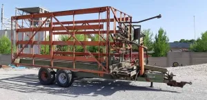 Samoutovarna i samoistovarna prikolica za bale - thumbnail 3